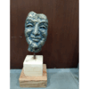 Brass Face On Wooden Stand